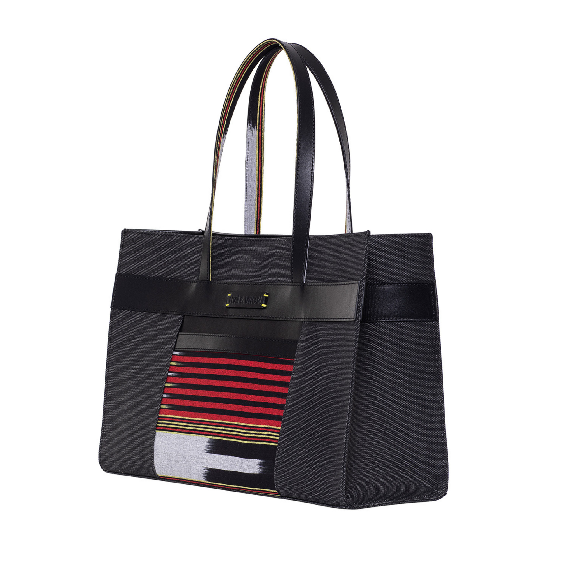 Zua black tote bag. Leather detailings on the body, leather hand strap, canvas on the body and handwoven fabric pocket in the front